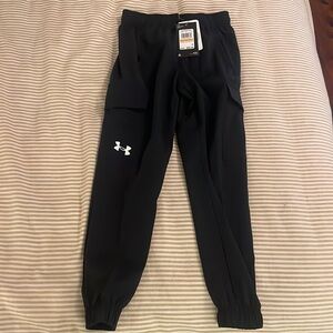 Youth size small Under Armour Black Pants. New with tags.